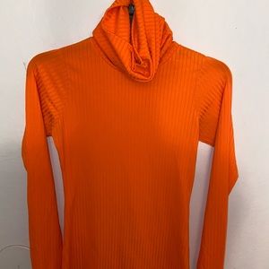 Orange turtleneck
